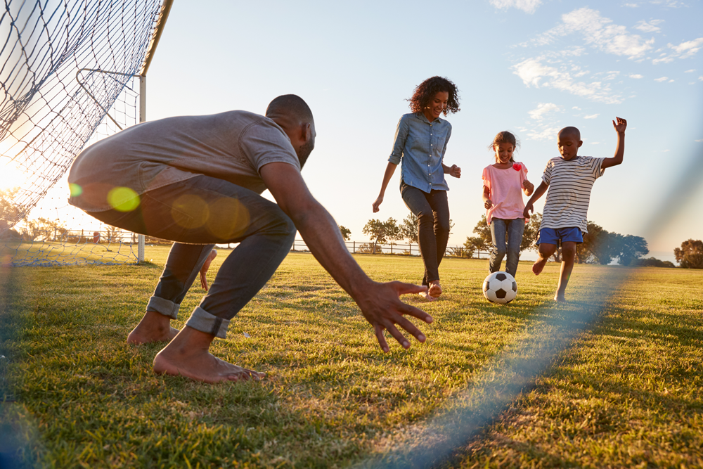 family plays soccer